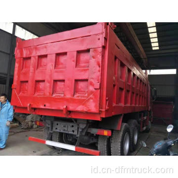 Perbaikan bagus howo dump truck menggunakan truk tipper